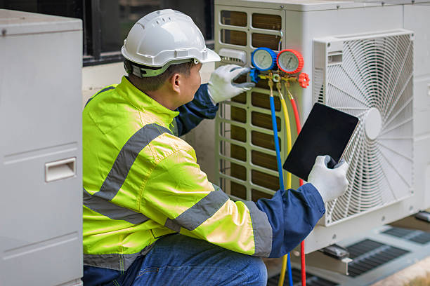 Professional Ductwork Repair technician working in Hopedale, MA
